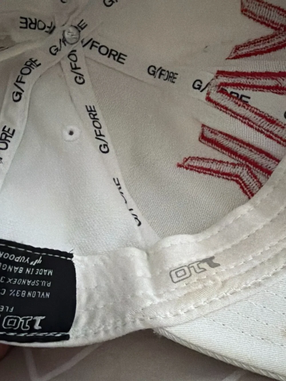 G/FORE White Baseball Cap with Red 'YAK' Embroidery
